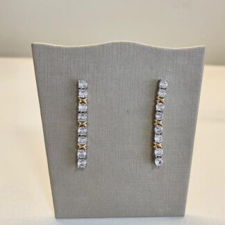 Brinco Riviera Fio em X em Ródio Branco e Banho de Ouro18k