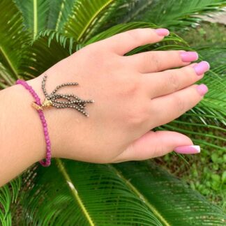 Pulseira de Rubi com Tassel em Pirita Banhada a Ouro 18k